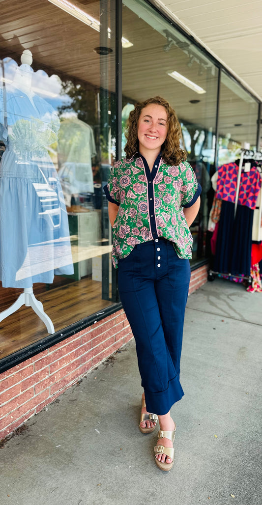 Green and navy pink trim top